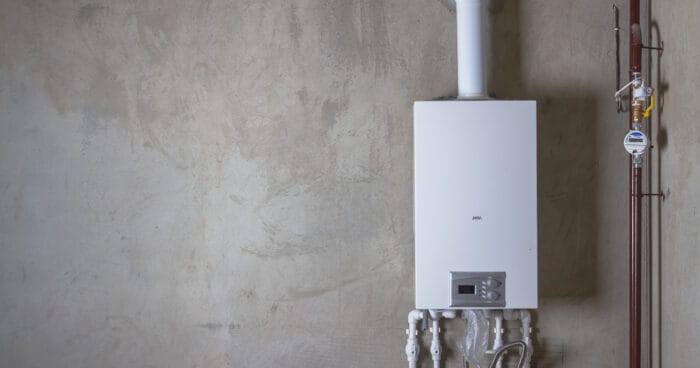 Double-circuit gas boiler in a new house for winter heating and water heating